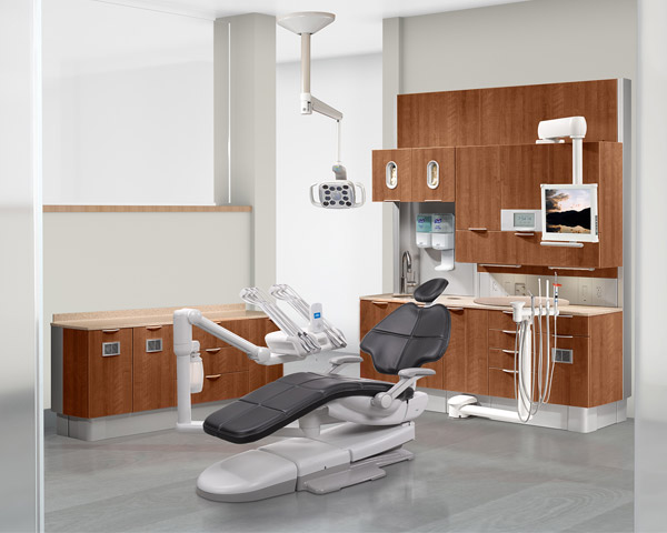 A-dec 500 dental chair with ebony upholstery in dental operatory